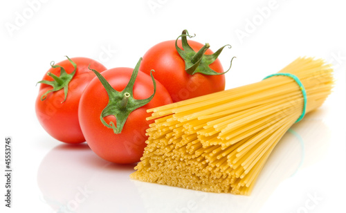 tomatoes and pasta on white background