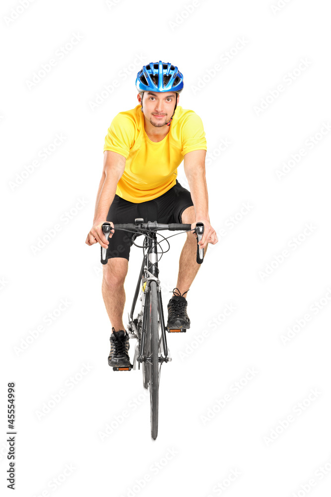 Full length portrait of a man with helmet riding a bycicle Full length portrait of a man with helmet riding a bycicle