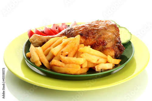Roast chicken with french fries and cucumbers