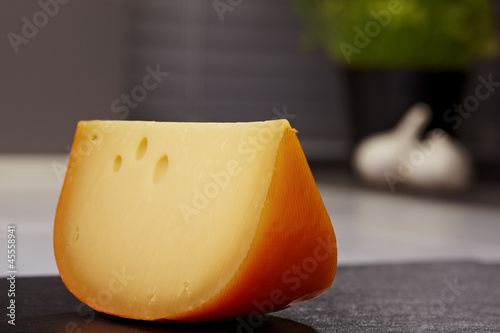 Piece of gouda cheese photo