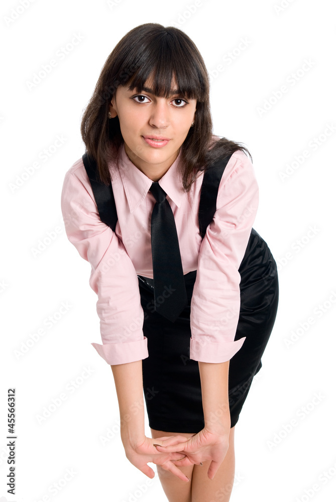 Young businesswoman demonstrating simple stretching Young businesswoman demonstrating simple stretching