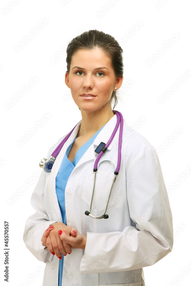Young female doctor with a clipboard looking