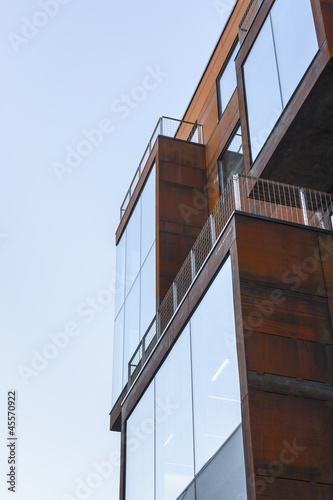 Modern architecture - metal box and glass wall building