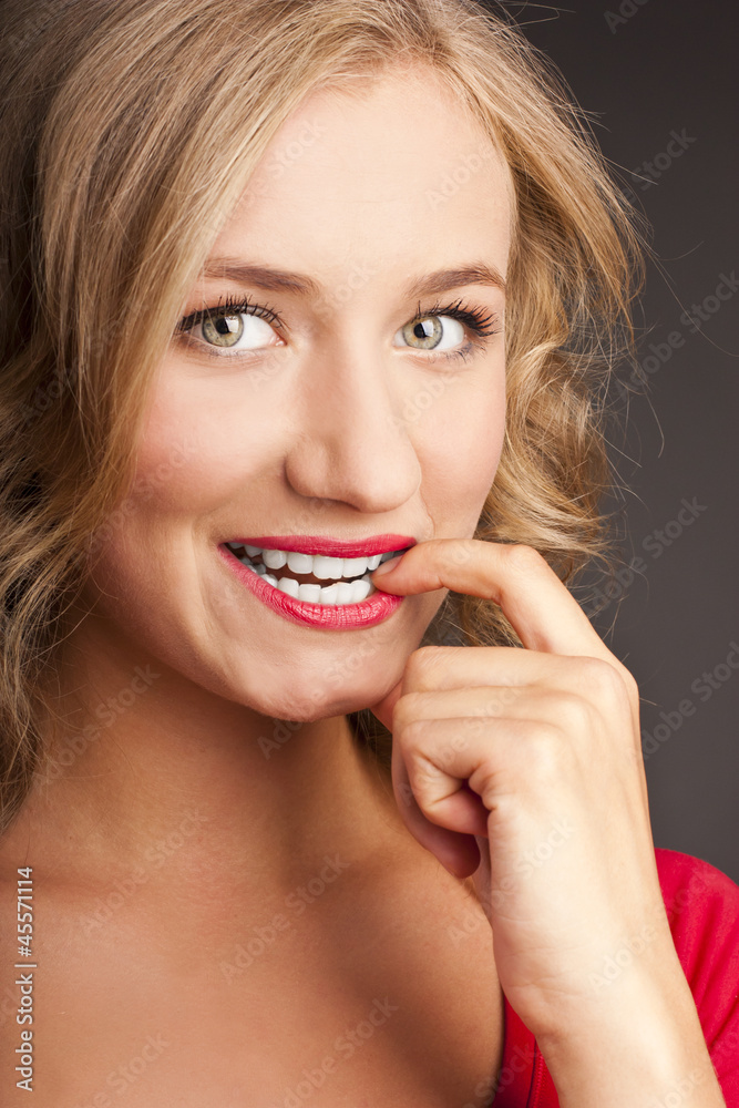 The beautiful blonde woman with red lipstick The beautiful blonde woman with red lipstick