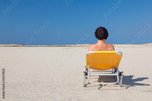 Woman alone on the beach 2.