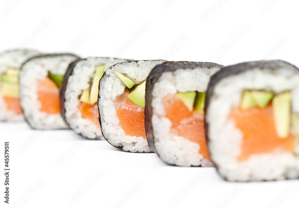 Row of delicious maki sushi rolls, isolated on white Row of delicious maki sushi rolls, isolated on white