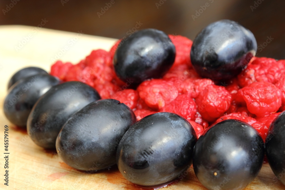 arrangement of wild raspberry and red grapes arrangement of wild raspberry and red grapes