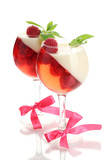 fruit jelly in glasses with raspberries and mint isolated