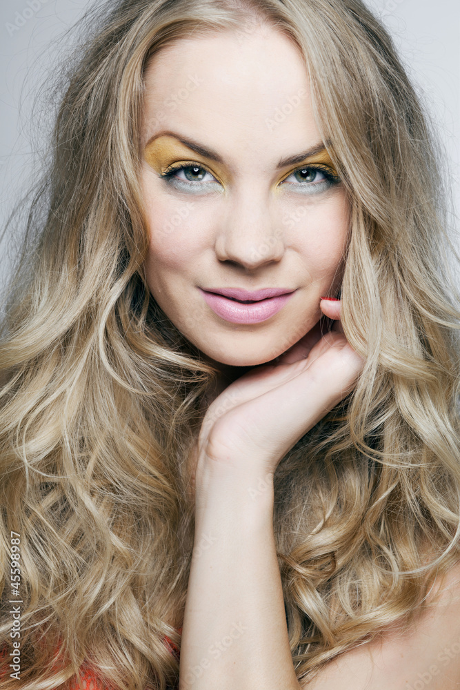 Blonde girl with long curly hair. Blonde girl with long curly hair.