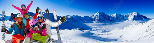 Ski, snow, sun and winter fun - happy family ski team #45600310