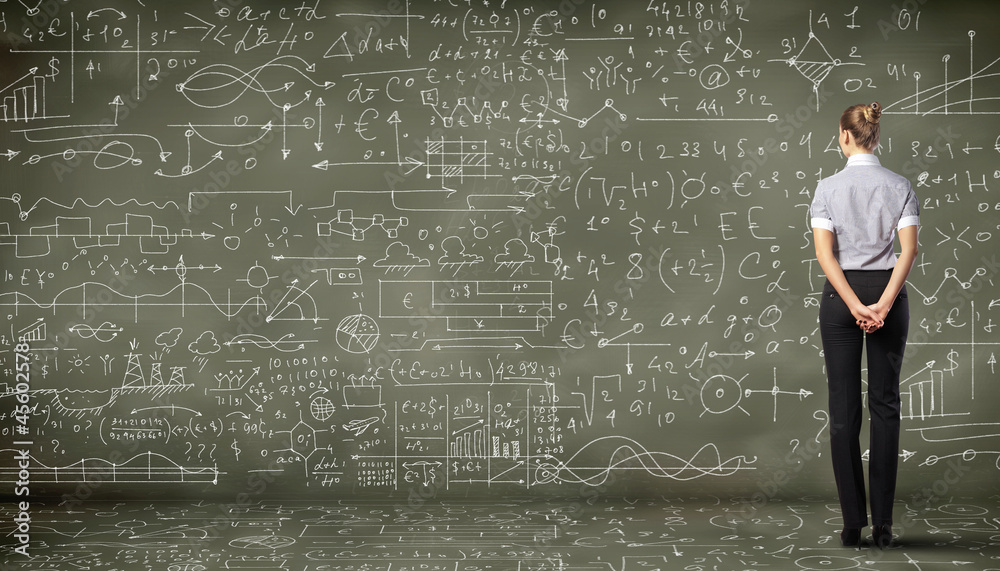 Business person against the blackboard Business person against the blackboard