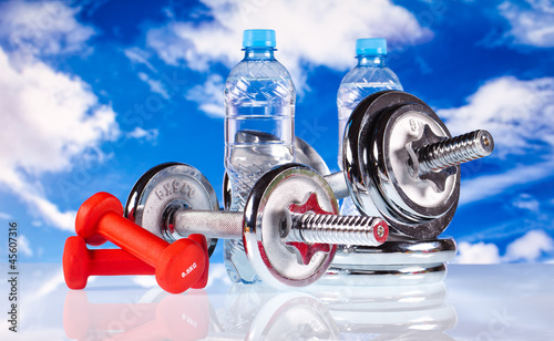 fitness equipment and water on bluesky background