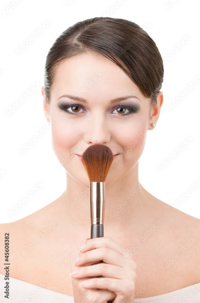 Woman with cosmetic brush for powder, isolated on white Woman with cosmetic brush for powder, isolated on white