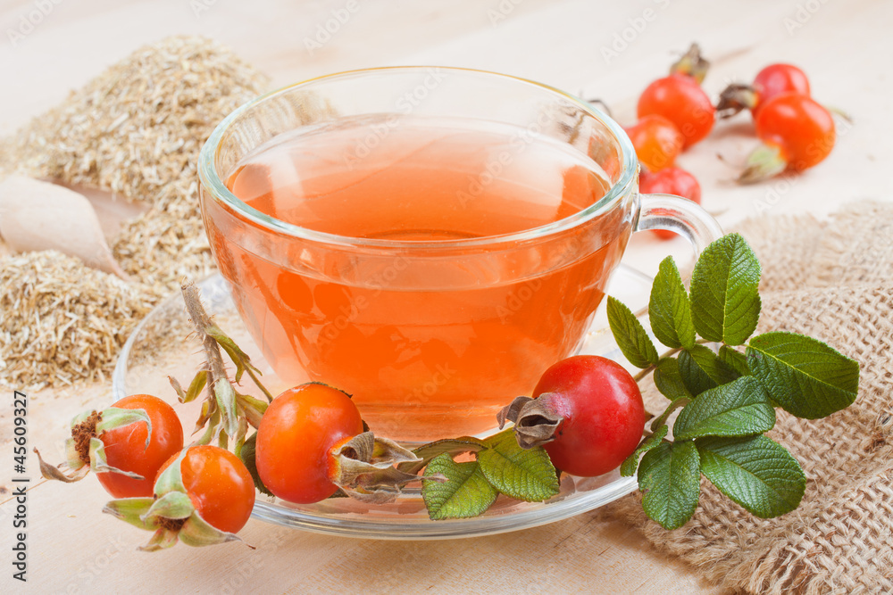rose hip tea and red berries rose hip tea and red berries