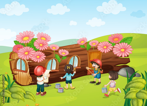 kids painting wooden house