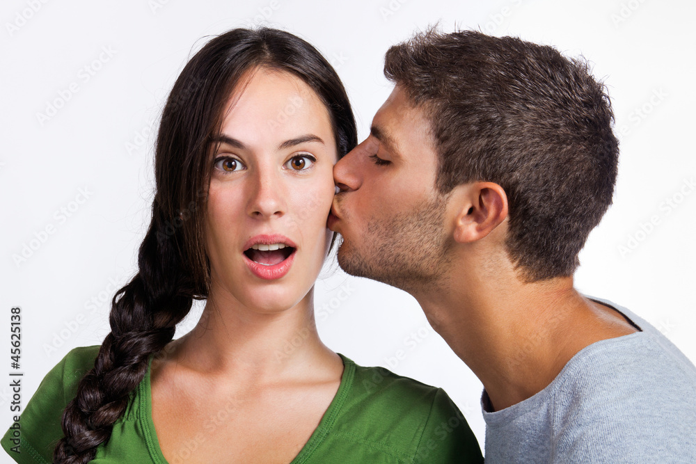 young couple kissing young couple kissing