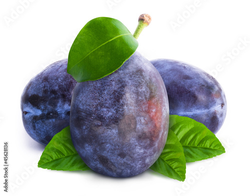 Group of plums with leaves