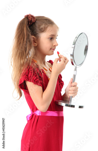 little girl in her mother's...