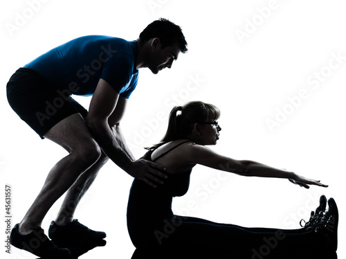 aerobics intstructor with mature woman exercising