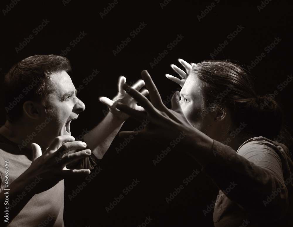 Man and woman screaming at each other. Marriage before divorce.
