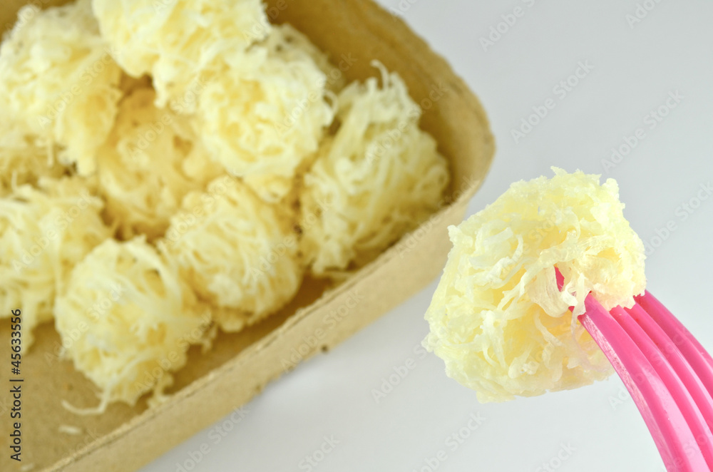 Golden threads thai dessert made form egg white cooked in syrup Golden threads thai dessert made form egg white cooked in syrup