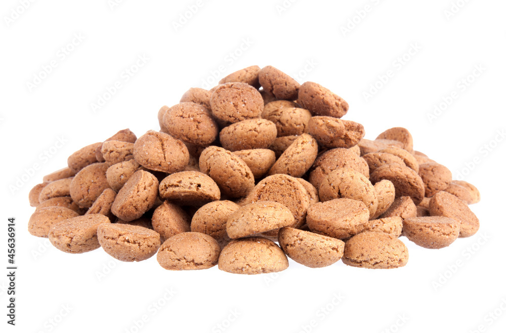 A big pile of ginger nuts on a white background. A big pile of ginger nuts on a white background.
