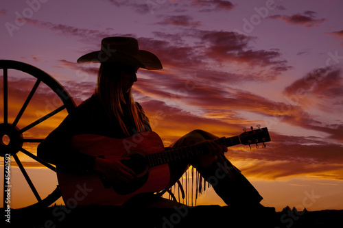 silhouette cowgirl guitar wagon