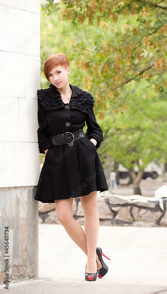 Beautiful woman in spring garden