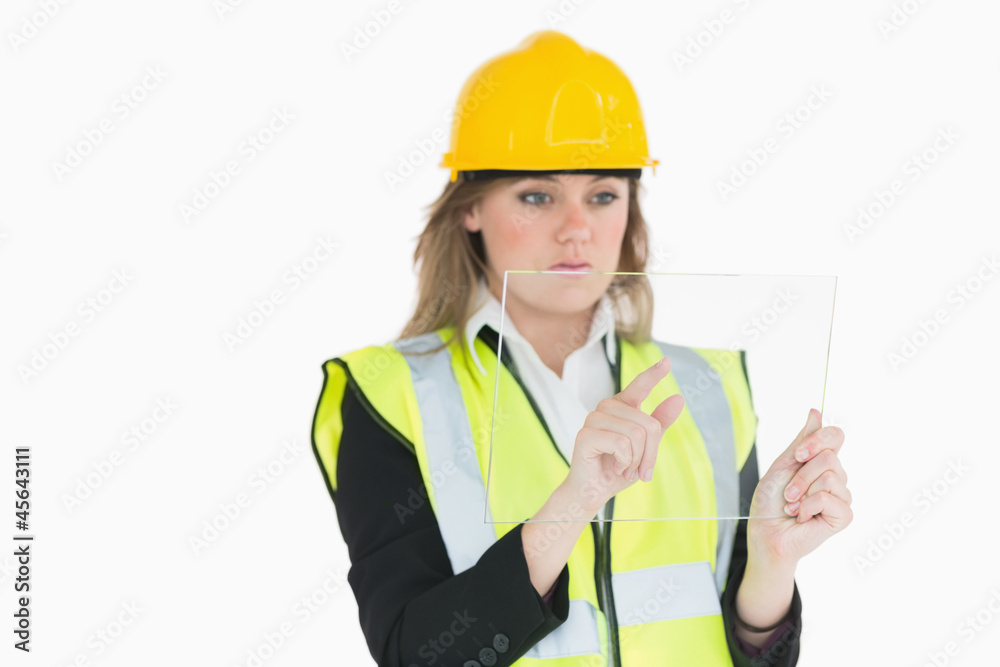Female architect touching on a pane Female architect touching on a pane