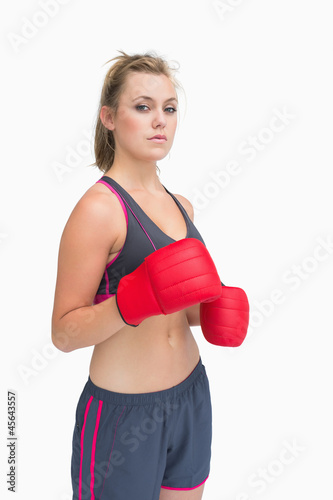 Woman wearing boxing gloves