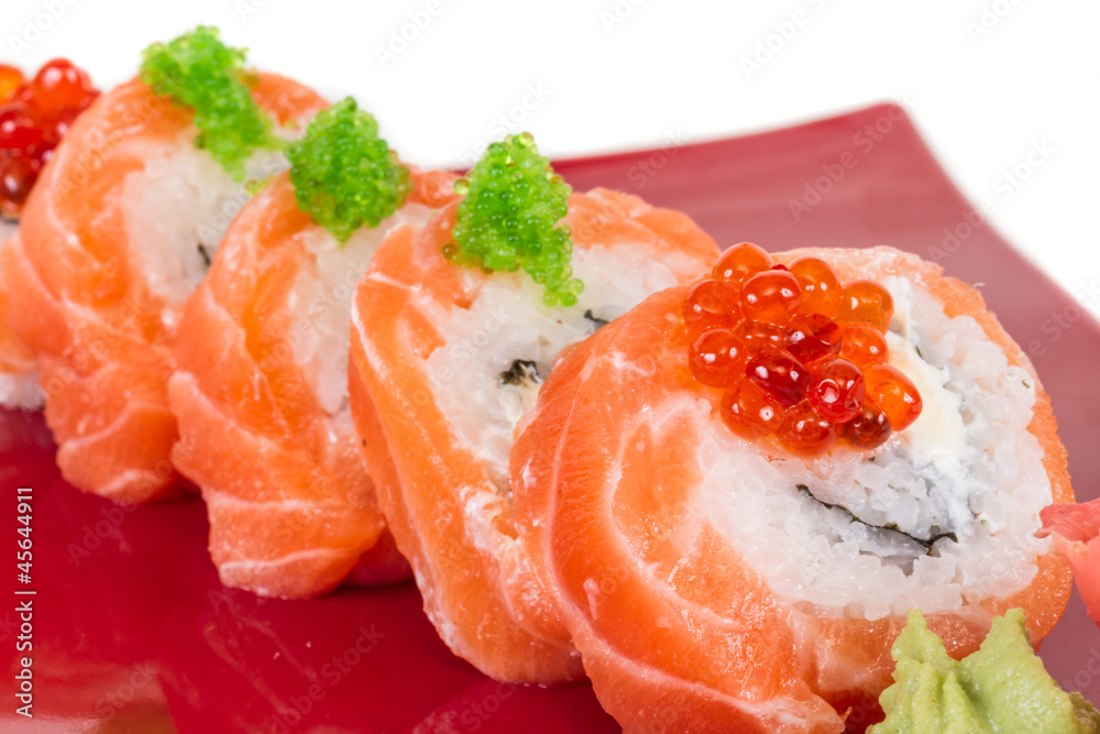Japanese sushi traditional japanese food.Roll made of salmon, re Japanese sushi traditional japanese food.Roll made of salmon, re