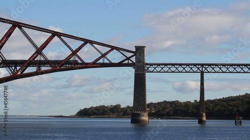 Train crossing Forth Rail Bridge Scotland photo