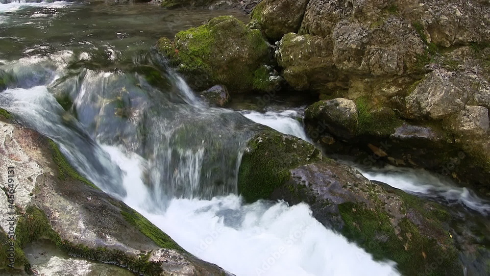 Rapid mountain river, with small waterfalls. Rapid mountain river, with small waterfalls.