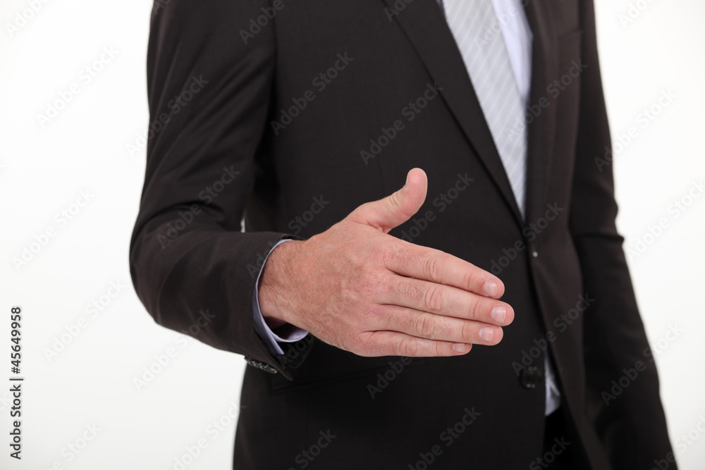 Cropped picture of a businessman about to shake hand.