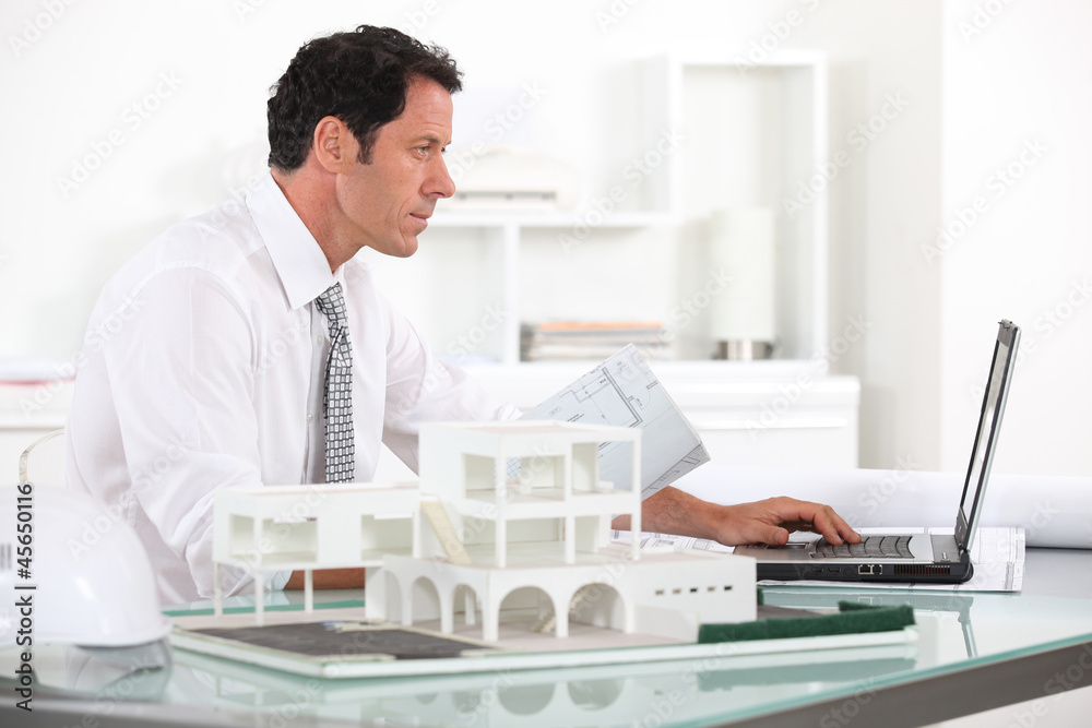 Architect working in his office Architect working in his office