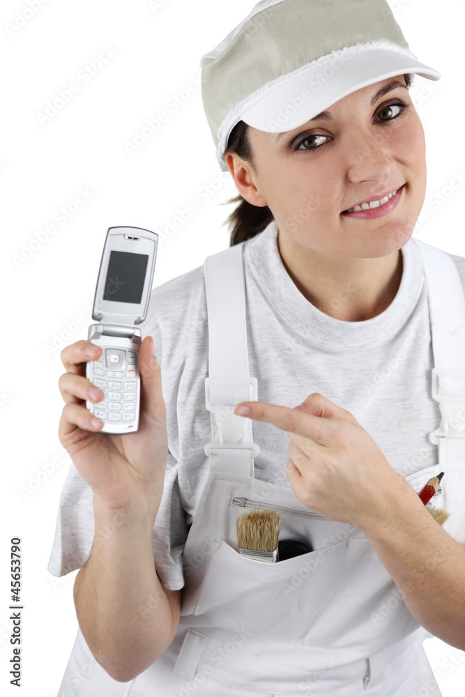 craftswoman holding a cell phone