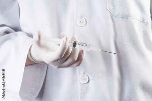 Doctor / Nurse holding a syringe