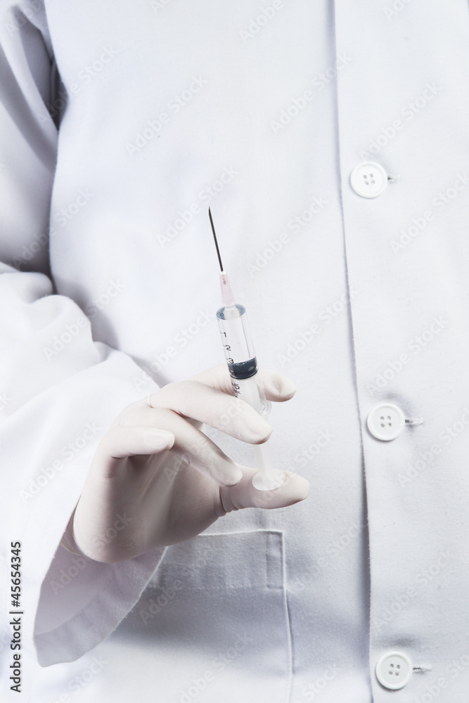 Doctor / Nurse holding a syringe Doctor / Nurse holding a syringe