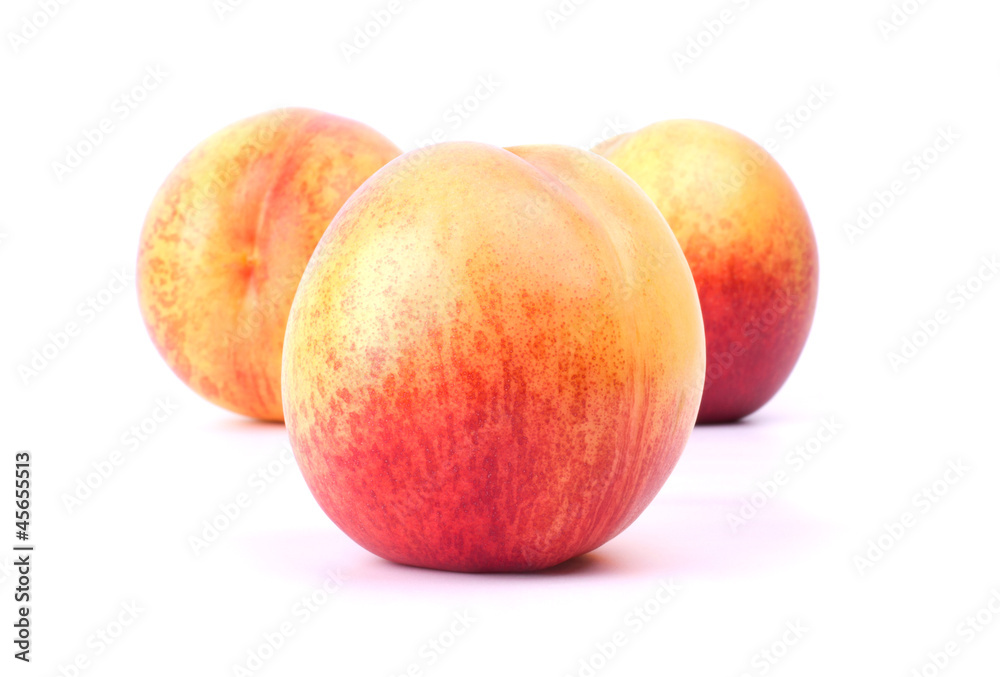 Three nectarines isolated on white background Three nectarines isolated on white background