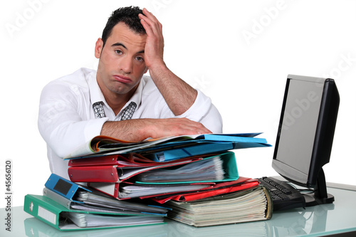 Фотография Overworked office worker