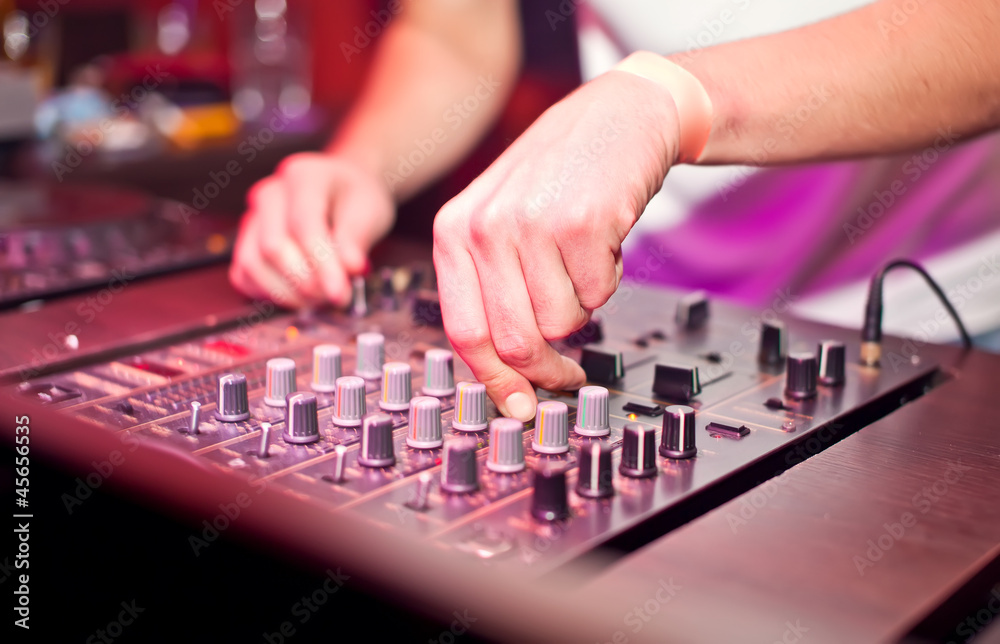 Fototapeta premium Dj mixing in night club