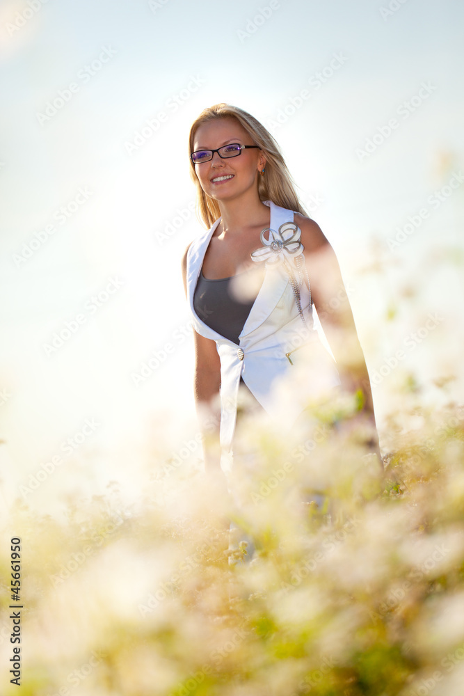 businesswoman standing on a field
