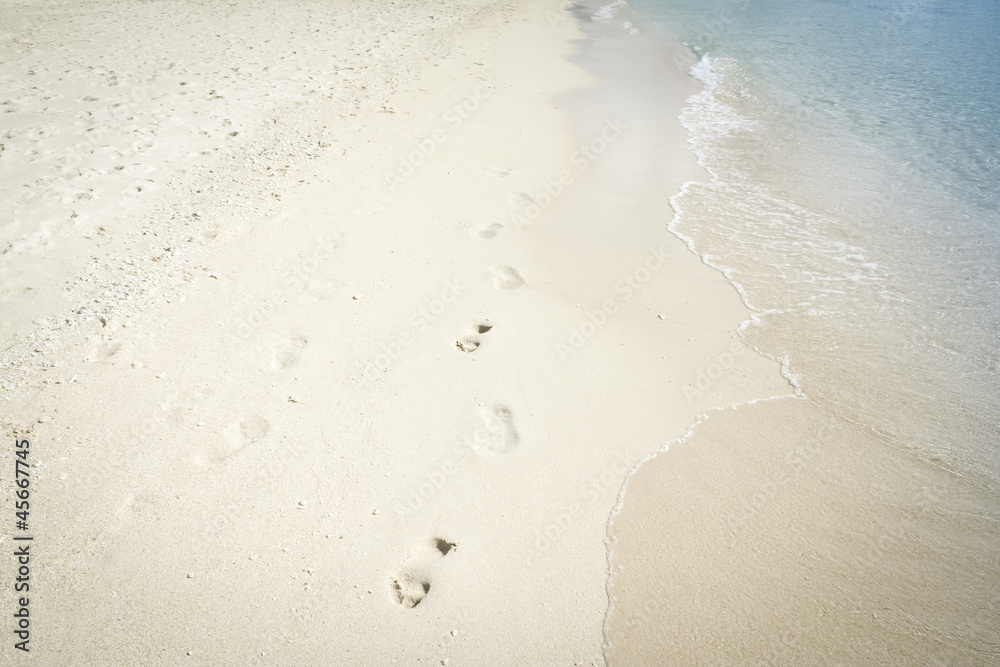 footprints in sand boracay beach philippines
