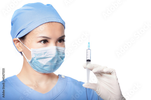 surgery woman doctor look syringe needle