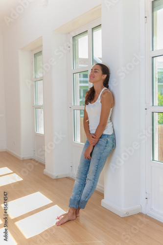 Young woman in her new home