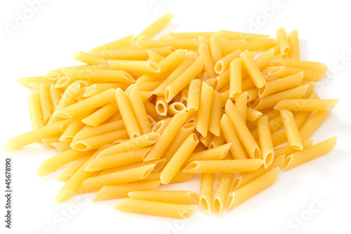dry penne on white background