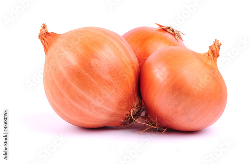 Wallpaper Mural Three bulbs of brown onion on white background Torontodigital.ca