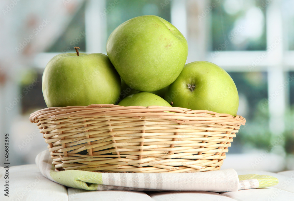 Ripe green apples with leaves in basket, Ripe green apples with leaves in basket,
