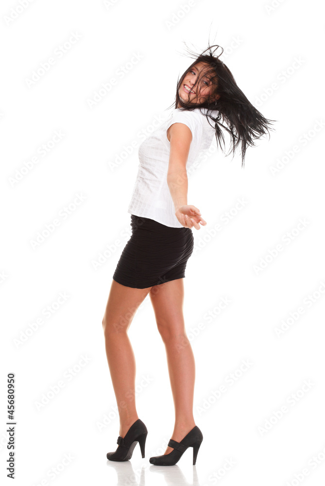 Fototapeta premium A joyous young female business executive celebrating success rai