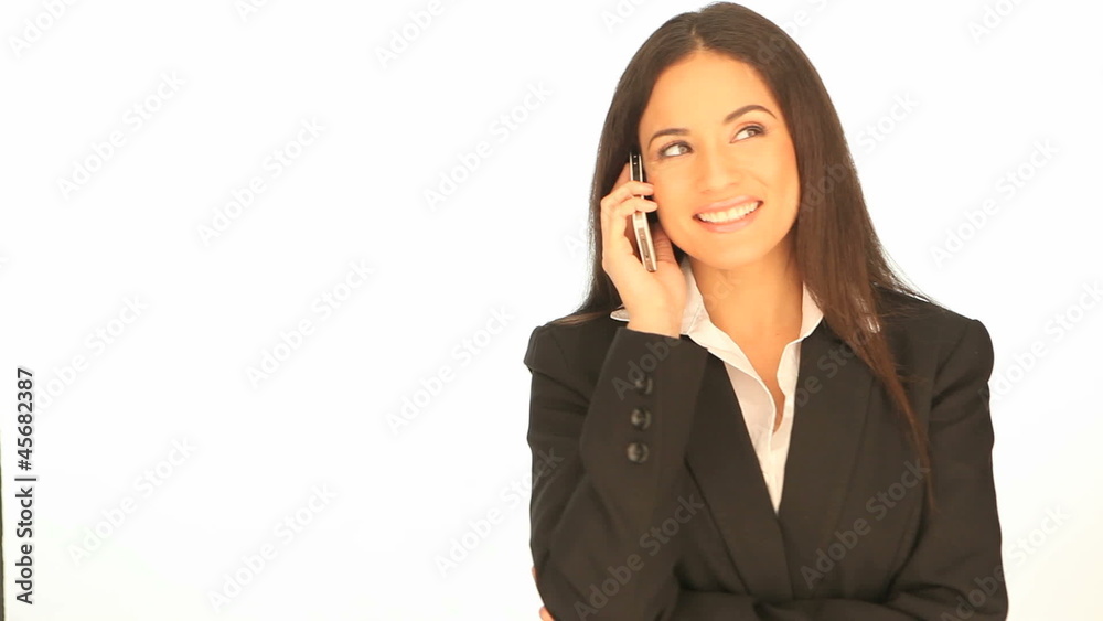Beautiful businesswoman using her mobile Beautiful businesswoman using her mobile